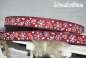 Preview: Webband "Schneeflocken" rot 1 Meter